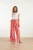 25087-Wide-Pants-Met-Dierenprint-In-Roze-En-Oranje.webp